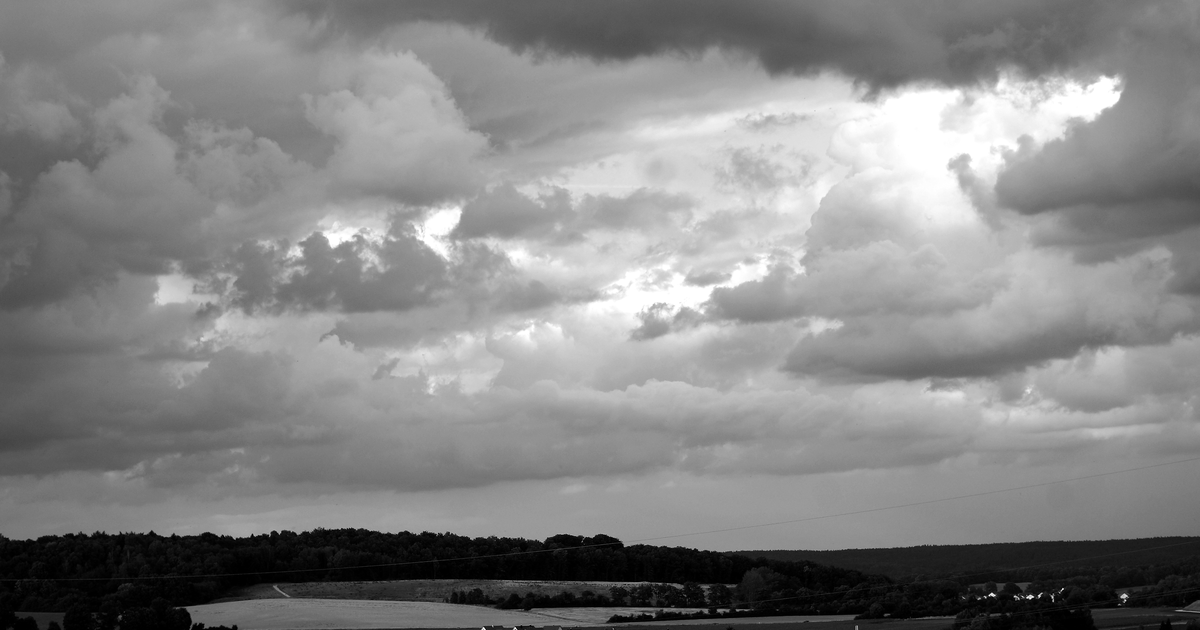 Dark storm clouds gathering over the countryside in Bavaria, Germany, as the weather service warns of severe thunderstorms