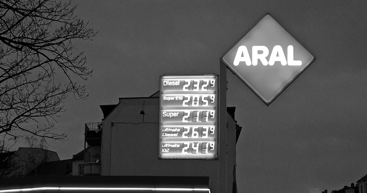 The illuminated price board of an Aral petrol station in Leipzig at dusk, showing diesel and petrol prices above two euros per litre